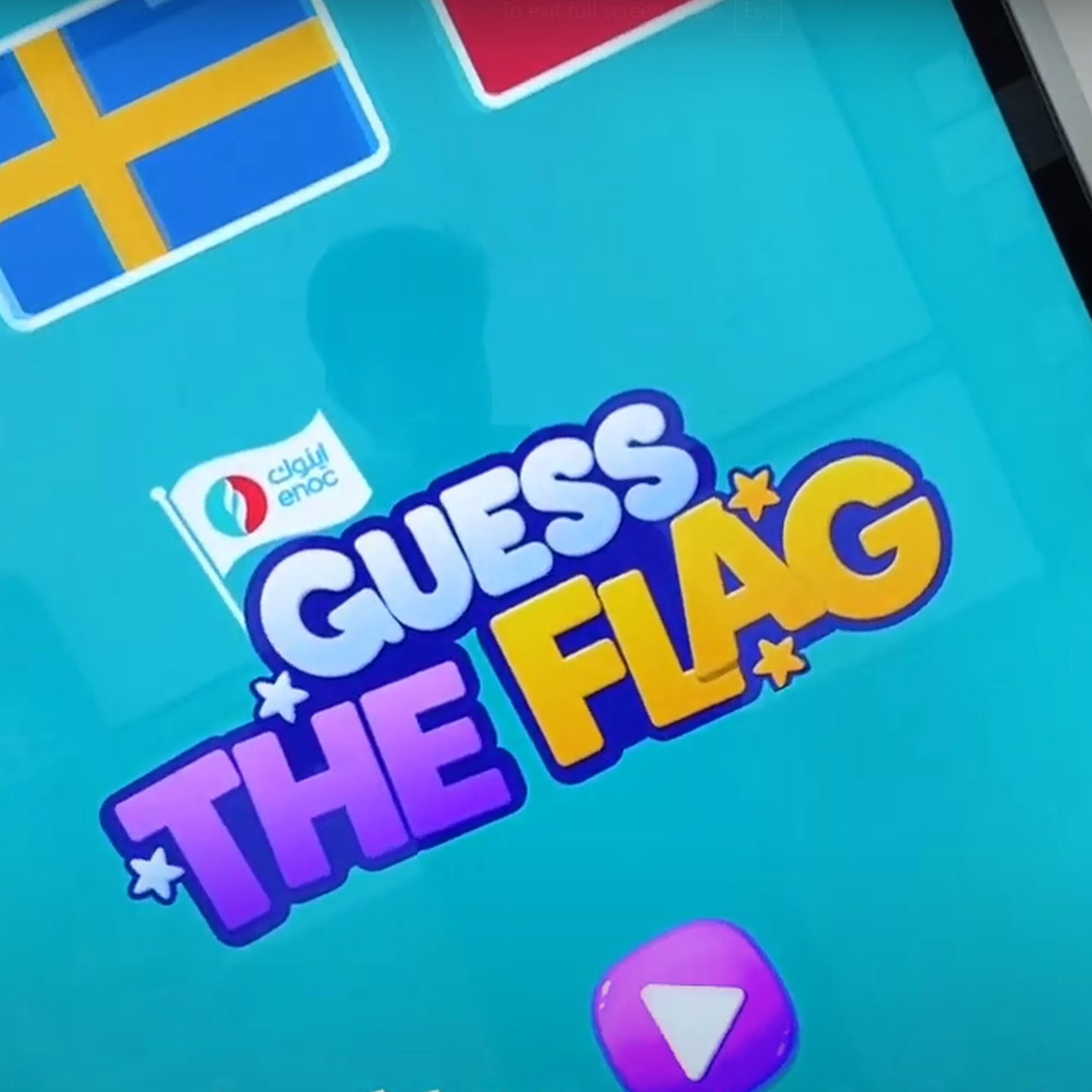 Participants playing the interactive Guess the Flag game at an event, engaging with a fun, branded quiz experience that tests geographical knowledge in a lively setting.